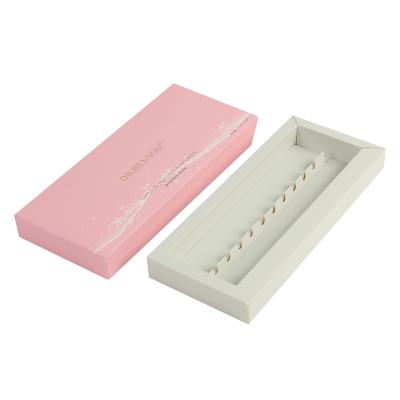 China Handmade Custom Logo Skin Care Essence Boxes Printed Pink Gift Packaging for sale