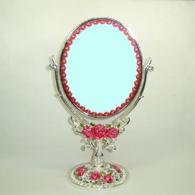 China Elegant colored cosmetic mirror magnified in silver shiny metal for sale