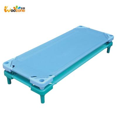 China Fire Retardant Waterproof Mesh Fabric Bed Kids PP Kids Mesh Bed Plastic Crib Cloth Toddler Stackable Bed for sale