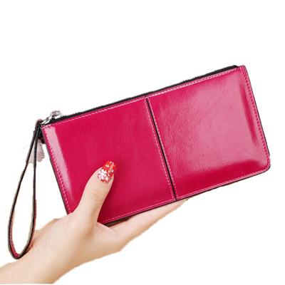 China Factory direct waterproof women wallet with bracelet leather zipper women grab wallet for cards keys phone for sale