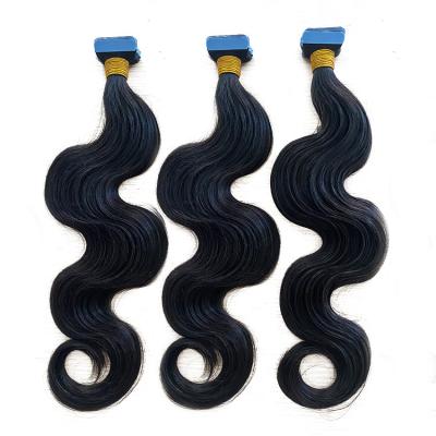 China Raw Virgin Remy Curly Tape Loop Ins Cuticle Aligned Natural Hair Vendor Double Pulled Tape In Hair Extensions 100 Hair for sale