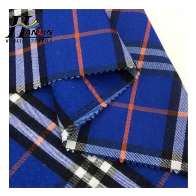 China Hot sale anti-static high quality 21S chatter dyed 100 cotton plaid flannel fabric 140gsm for men's shirt in stocklot for sale