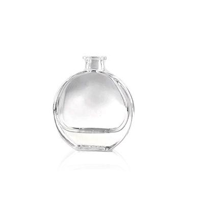 China Wholesale Cosmetic Flat Round Perfume Bottle 90ML Glass Bottle Empty Perfume Bottle For Perfumes for sale