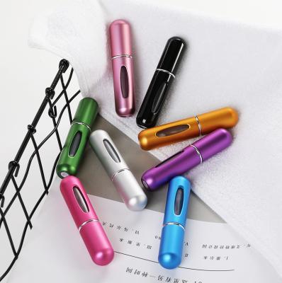 China Eco-friendly Red Aluminum Portable Refillable Atomizer Refillable Red Aluminum Mini Perfume Spray Bottle Heart Perfume Spray Glass Bottle for sale