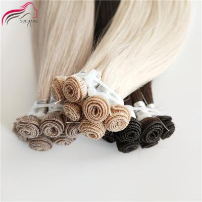 China No Cuticle Chemical High Quality Russian Human Hand Tied Weft Remy Hair Without Glue Extremely Thin And Soft Hand Tied Weft Hair for sale