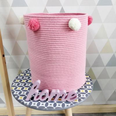 China Sustainable Ready To Ship Storage Hamper Laundry Hamper Large Pink Cotton Rope Basket With Match Color Yarn Wool Ball for sale