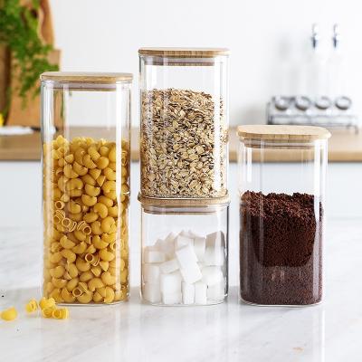 China Sustainable Kitchen Glass Storage Jars Airtight Food Safe Glass Jar Bamboo Lid for sale