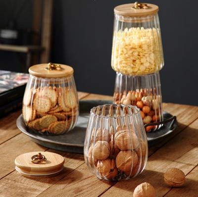 China Petal Heatable Glass Storage Jar Japanese Style Transparent Glass Jar With Bamboo Lid for sale