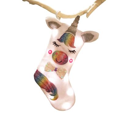 China The Christamas Home Decoration Gift Bag/Unicorn Light Animal Gift White Christmas Stockings With LED Christamas Decoration New Babble Cartoon Christmas Stockings for sale