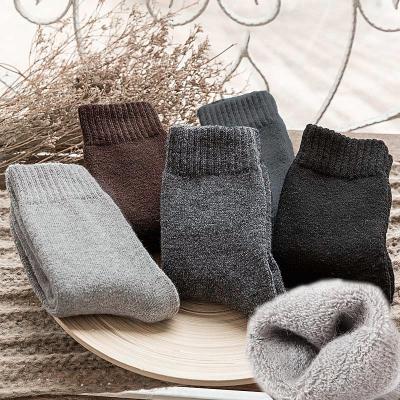 China Soft pure warm thick warm fluffy wholesale color antibacterial winter socks wool towel fashion fashion crew men's comfortable woolen socks for sale