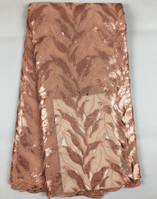 China oz04 peach water soluble color high quality handcut embroidered sequins lace up double organza fabric for sale