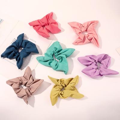 China Fashionable floral hair band of a triangular pin European and American elastic hair band factory wholesale CIA style hair band for sale