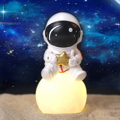 China Planet Small Lamp China Astronaut Bedroom Table Lamp Desk Enamel Anti-fall Night Lamp Interstellar Children Small Decorative for sale