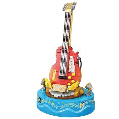 China Sound Construction Eco-friendly Material Series-Key Toy Building Block Sets of Music Box Electric Guitar (308PCS) for sale