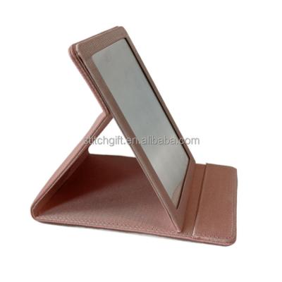 China Desktop Mirror PU Leather Foldable Cosmetic Mirror Embossed Logo Makeup Mirror for sale