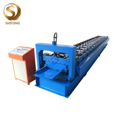 Китай self-locked strip steel roof panel roll forming machine in china продается