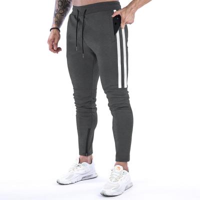 China Breathable Custom Design Running Straight Mens Stacked Trotter Gym Clothing Leg Pocket Sweatsuit for sale