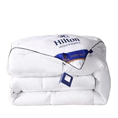 China Hot wholesale cheap price high quality hotel comforter with bag king size hilton 4kg white comforter for sale