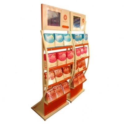 China Eco-friendly Senmei Custom Metal Cosmetics Perfume Supermarket Display Stand for sale