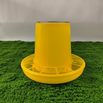 China Durable Plastic Poultry Feed Bucket Red And Yellow Storage Solution for sale