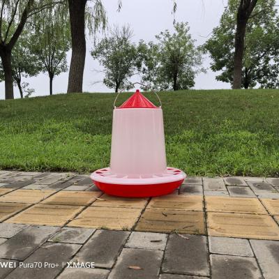 China Automatic Chicken Poultry Feeder Capacity 12L Red feeder with lid Chinese factory goes directly to Uganda for sale