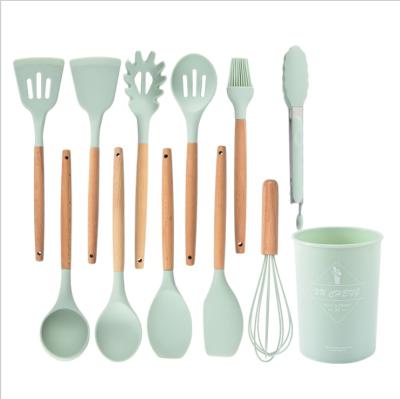 China Viable Luxury Silicone Cookware Cookware Set Eco Friendly Home and Kitchen Accessories with Wooden Handle for sale