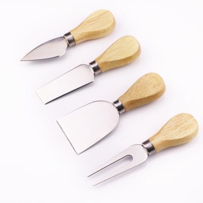 China Amazon Viable Top Selling High Quality Stainless Steel Cheese Slicer Butter Knife Set 4 Set Cheese Butter Cake Panel Cutter Tool Kit for sale