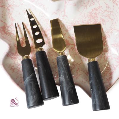 China Suanti Viable 4 Pieces New Metal Decorative Resin Cutter Marble Cheese Knives Set Stainless Steel Gold Mini Cheese Knife for sale