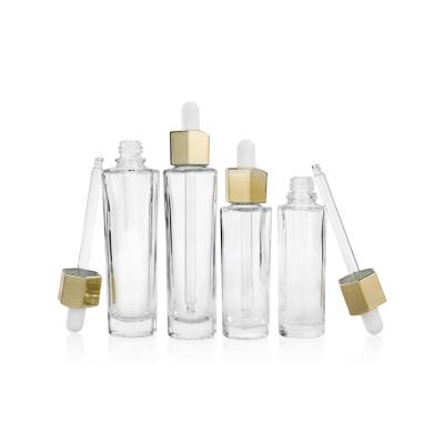 China High Quality Luxury Cosmetic Essential Oil Perfume Serum Dropper Clear Skin Care Glass Bottle 15ml 20ml 30ml 50ml With Gold Dropper for sale