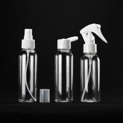 China Hot-selling 100ml high quality clear cosmo round bottle with sprayer and pump lid 24/410 for sale