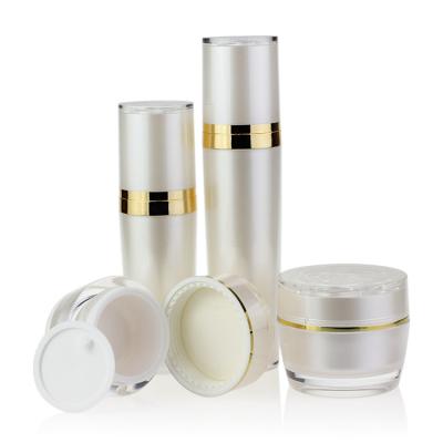 China Custom Cosmetic Skin Care Cosmetic Packaging Set Gold Plastic Collar Recycled PET Bottle Acrylic Round Foam Lotion Bottles for sale