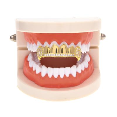 China Teeth Decoration Hiphop Body Jewelry Real Iced Out Upper Teeth and Lower Teeth Vampire Grills Halloween Gold Teeth Grillz for sale