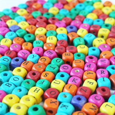 China DIY Bracelet Color Alphabet Loose Beads In Cube Wooden Mixed Spacer Letter For Kids DIY for sale