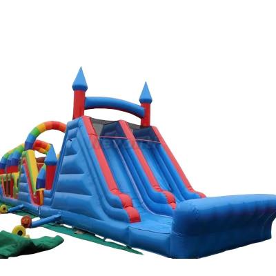 China Rotating Obstacles Game in Giant Adult Bounce House Commercial Inflatable Slides for sale