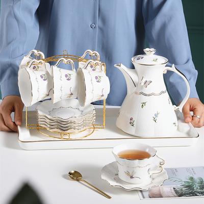 China Viable Flower Printed Porcelain Coffee Tea Gift Sets 6 Cups With Teapot Luxury European Ceramic Tea Sets With Metal Stand for sale