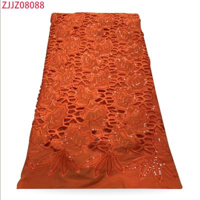 China 2021 Fashion Water Soluble African Jacquard Perforated Wax Fabric Lace Sequin Fabric for sale