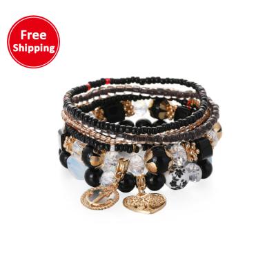 China 2021 new bohemian ethnic wind bracelet tree of life color pendant bead multilayer bracelet for sale