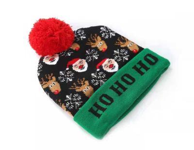 China Fashion Christmas Hat Designs LED Christmas Sweater Santa Light Knitted Hat for sale