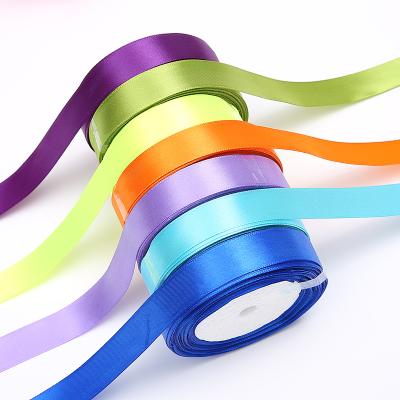 China Bright Color Fine Texture Bright Color Flexible Handle Smooth 2.5 Cm Polyester Roll Satin Ribbon Solid Color for sale