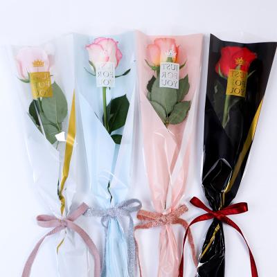 China Creative Simple Bouquet Florist Bag Production Love Heart Clear Sweet Packaging Rose Plastic Bag for sale