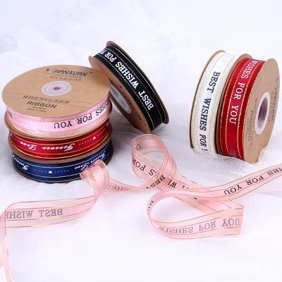 China Fashionable Phnom Penh Logo Satin Bow Print Ribbon English Wedding Gilding Process Decoration for sale