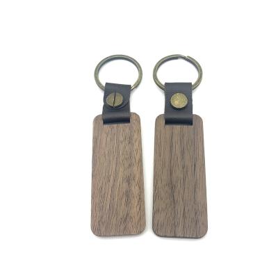 China Wholesale Simple Wooden Keychains Europe Fashion Key Chain Blanks Custom Logo for sale