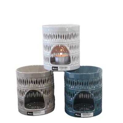 China Luxury Cylinder Hollow Ceramic Promotional Gift Items Christmas Tealight Candle Holder for sale