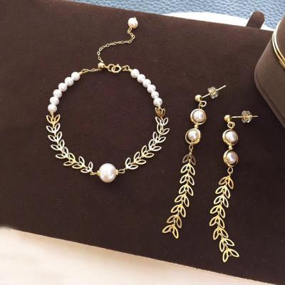 China Cute Creative 14K Gold Plated Leaf Tassel Earrings Bracelet Set Real Natural Freshwater Pearl 925 Silver Needle Earrings Jewelry Set for sale