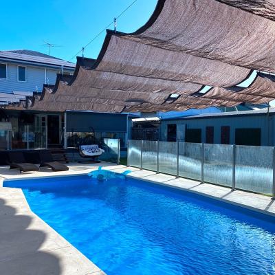 China Home Sun Shade Complete Set 2m x 10m 95% Sun Sails Anti UV Breathable HDPE Fabric Telescopic Wave Sunshade Net For Pool Sun Deck for sale