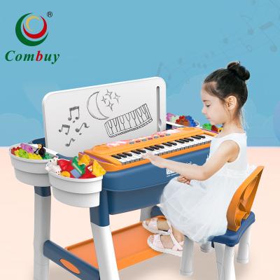 China Multiple Activities Kids Toy Game Piano Chair Set Table With Building Blocks for sale