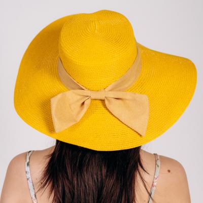 China Wide Picture Women Brim Beach Hat Bowknot Summer Sun Foldable Straw Hat for sale