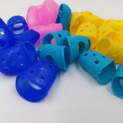 China Musical Instruments Accessories Comfortable Silicone Fingertip Guards Guitar Fingertip Protectors Anti-Pain Finger Cap for sale