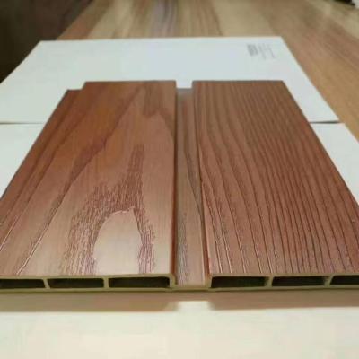 China New Design Waterproof Bamboo Wood Grain Stone Grain WPC Wall Panel Co-Extrusion And Wood Fibers With PVC Fireproof Moistureproof Board for sale