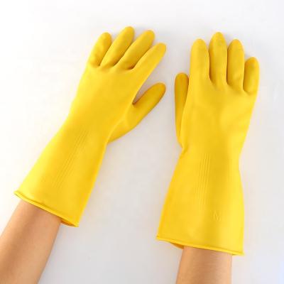 China Household Comfortable Custom Yellow Reusable Kitchen Latex Dishwashing Gloves Waterproof Price for sale